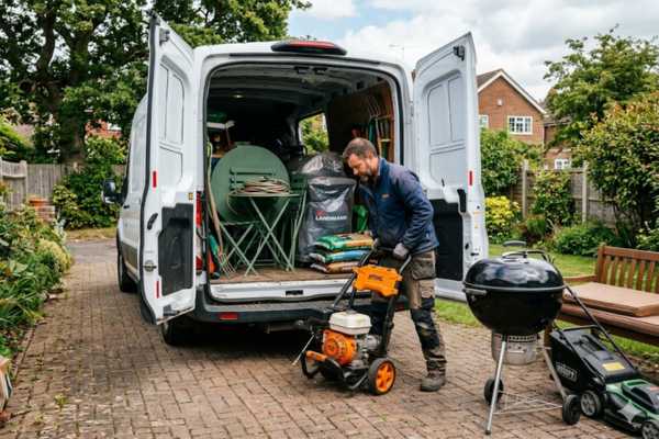 Garden equipment loaded securely in a Luton van for courier delivery